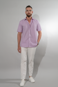 Man wearing lilac half sleeve semi formal shirt