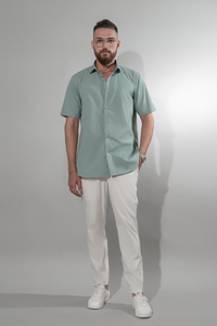 Man wearing Stylish cotton shirt pairing with white trousers
