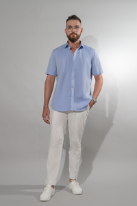 Man standing in blue cotton Summer shirts